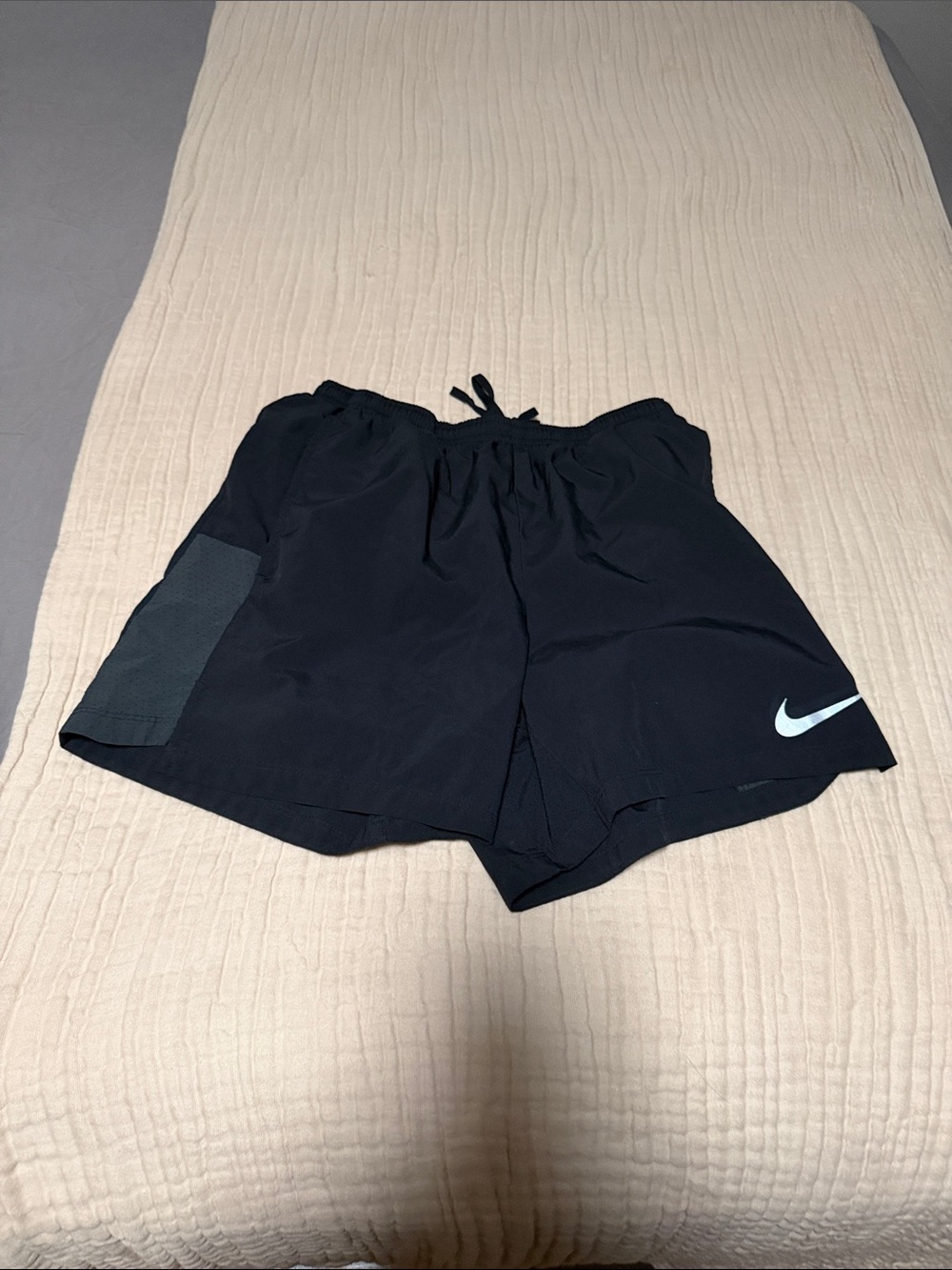 Nike Black Athletic Shorts with Light Blue Swoosh
